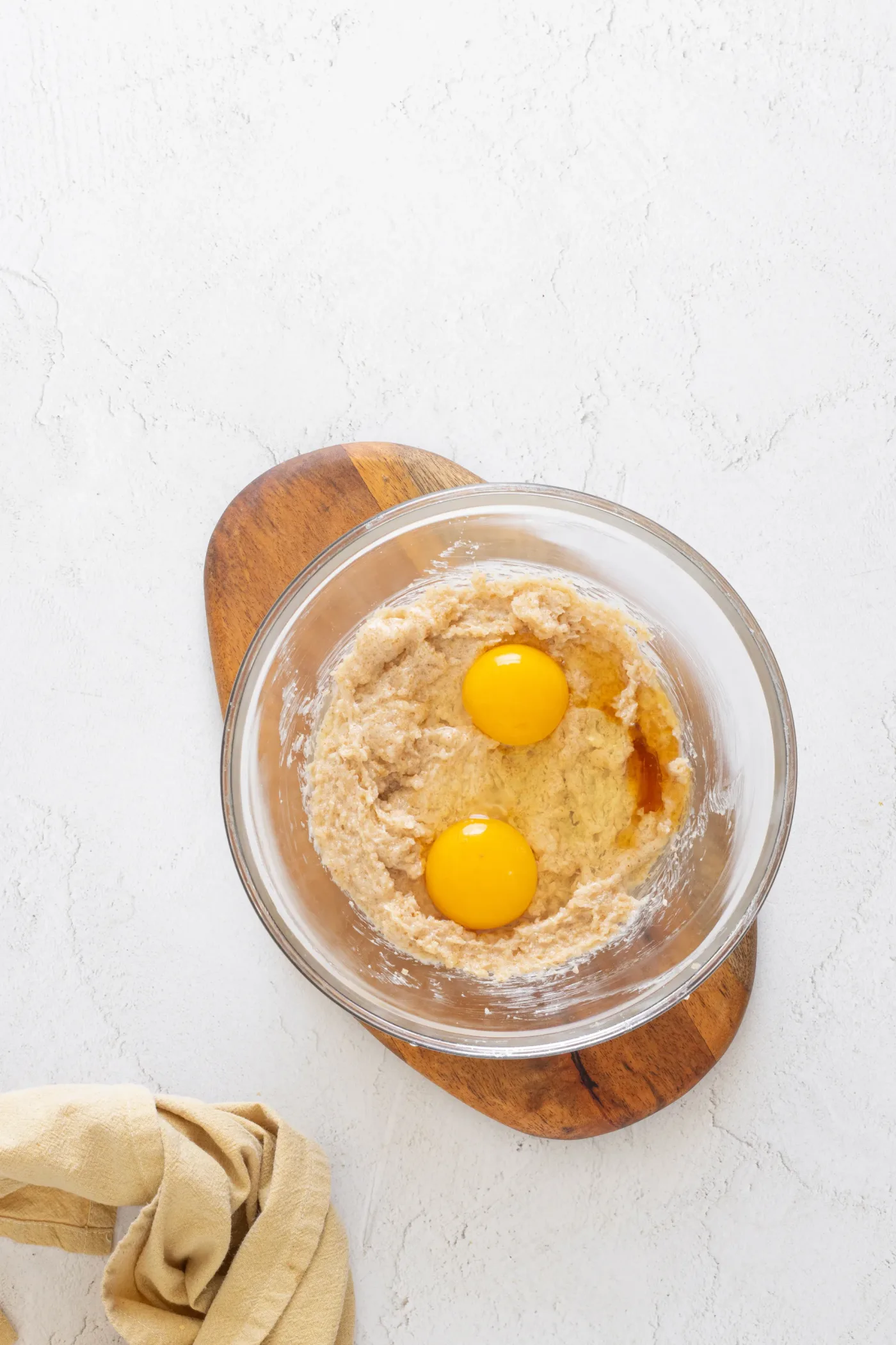 Egg, egg yolk, and vanilla added to the creamed brown butter mixture